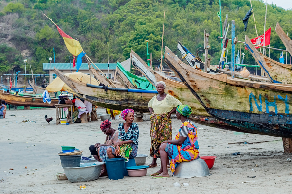 Fish Mongers waiting patiently to see their fishermen come back with enough catch. Photo credit: Yusif Dadzie, 2023
