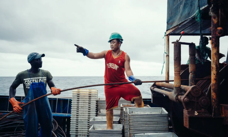 Chinese and local staff operate machinery on a fishing boat, Picture credit: Ghana Navy