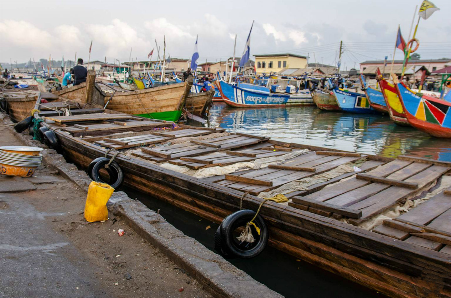Frozen fish in slabs packed in a canoe in Elmina