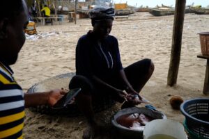 Juliet Efemena, a fish processor in Guinea-Bissau. Credit: Gideon Sarpong, iWatch Africa, November 2023.