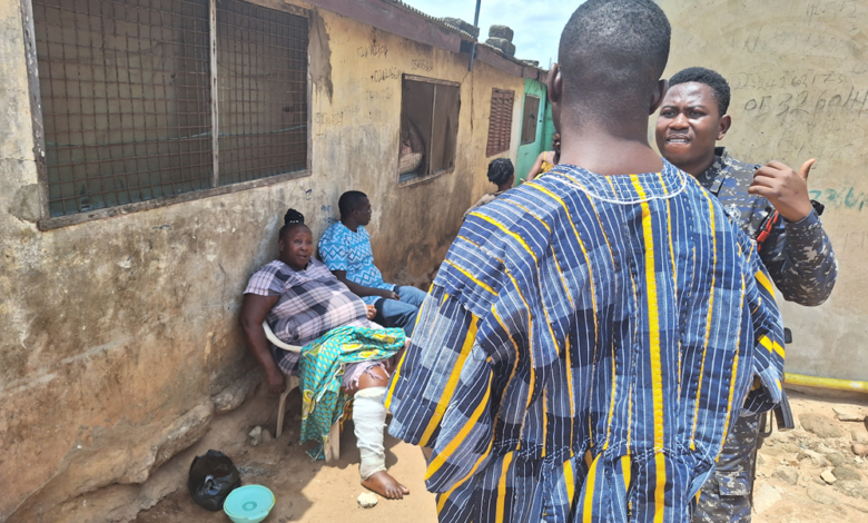 Afua Poma (Maame Turtle) seated on left during the time of her arrest, with two police officers in front. Image credit: Gideon Sarpong, 2024.