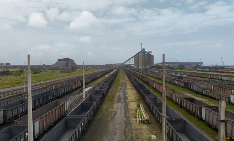 Empty coal trucks at Richard’s Bay. CREDIT: Oliver Stallwood